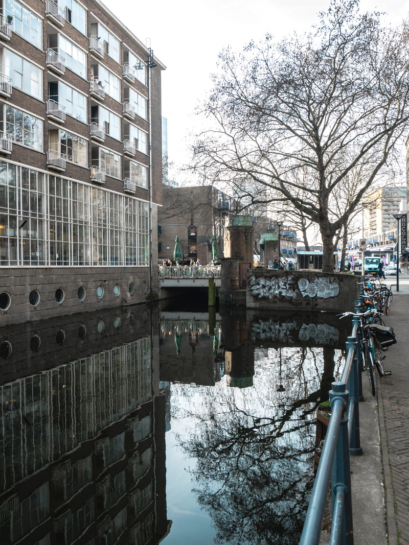 bicycle, plant, winter, building exterior, architecture, no people, street, river, bare tree, transportation, canal, bike, mirror, outdoors, building, mode of transportation