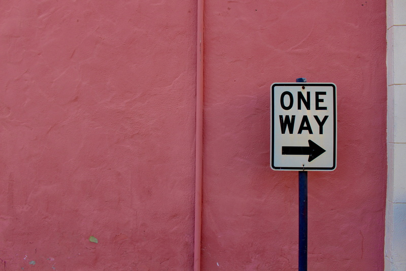 no people, one way, pointer, symbol, safety, guidance, wall, outdoors, western script, close-up, information sign, red, warning sign, architecture, communication