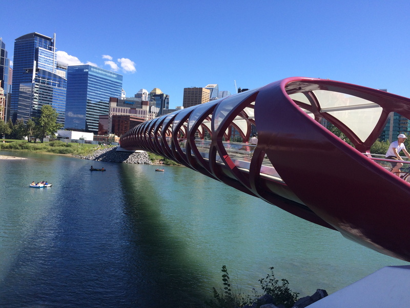 office building exterior, skyscraper, river, sky, modern, man, building, connection, city, bay, architecture, bicycle, alberta, day, swimming pool, Canada