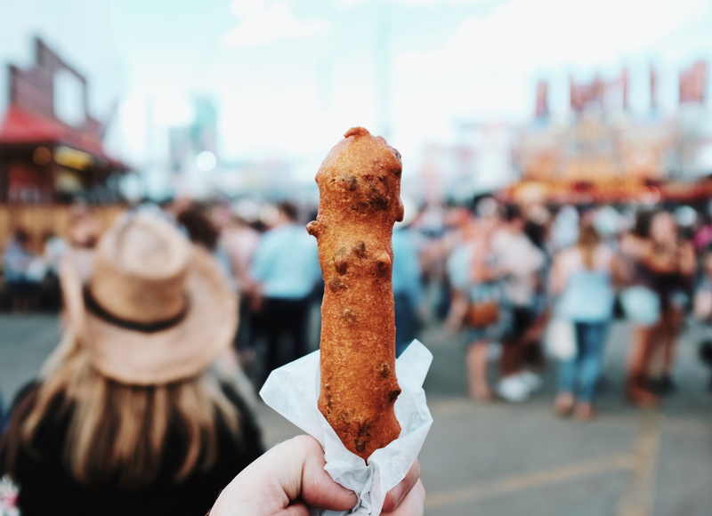 dessert, unhealthy eating, temptation, focus, food, bread, fair food, corndog, person, real people, creme, one person, incidental people, food presentation