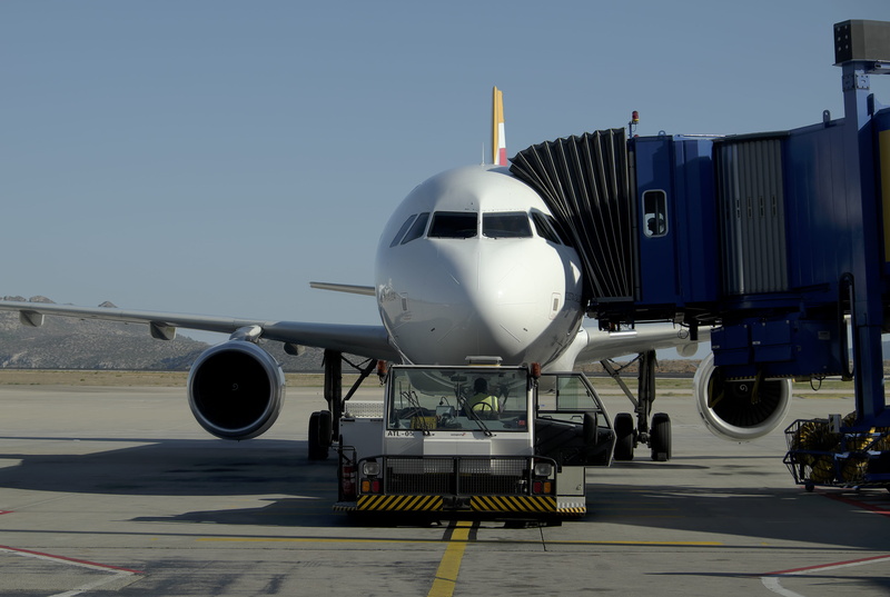 flight, public transportation, no people, plane, outdoors, day, jet engine, blue, sunlight, airplane, mode of transportation, sky, clear sky, journey, nature
