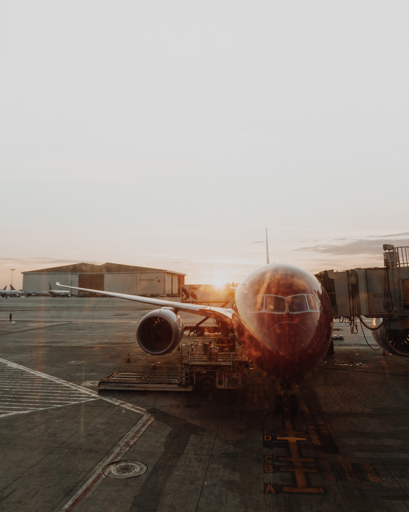 land vehicle, airplane, commercial airplane, nature, departure, clear sky, passenger boarding bridge, sunburt, usa, public transportation, airport runway