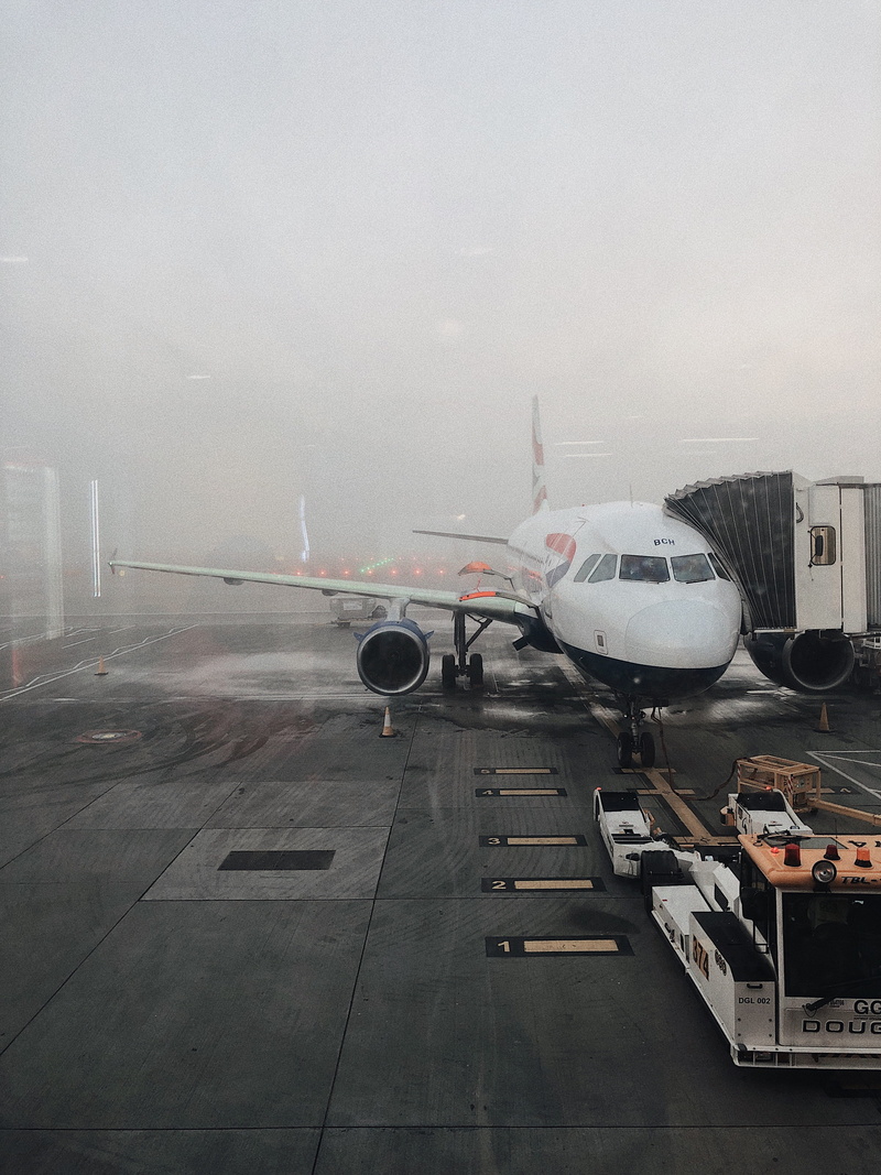 transportation system, passenger boarding bridge, commercial airplane, stationary, mode of transportation, window, airplane, no people, aircraft, sky, airport