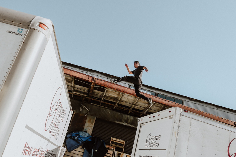person, truck, industry, sky, outdoors, architecture, building exterior, one person, men, business, 4K, built structure, standing, occupation, day, working