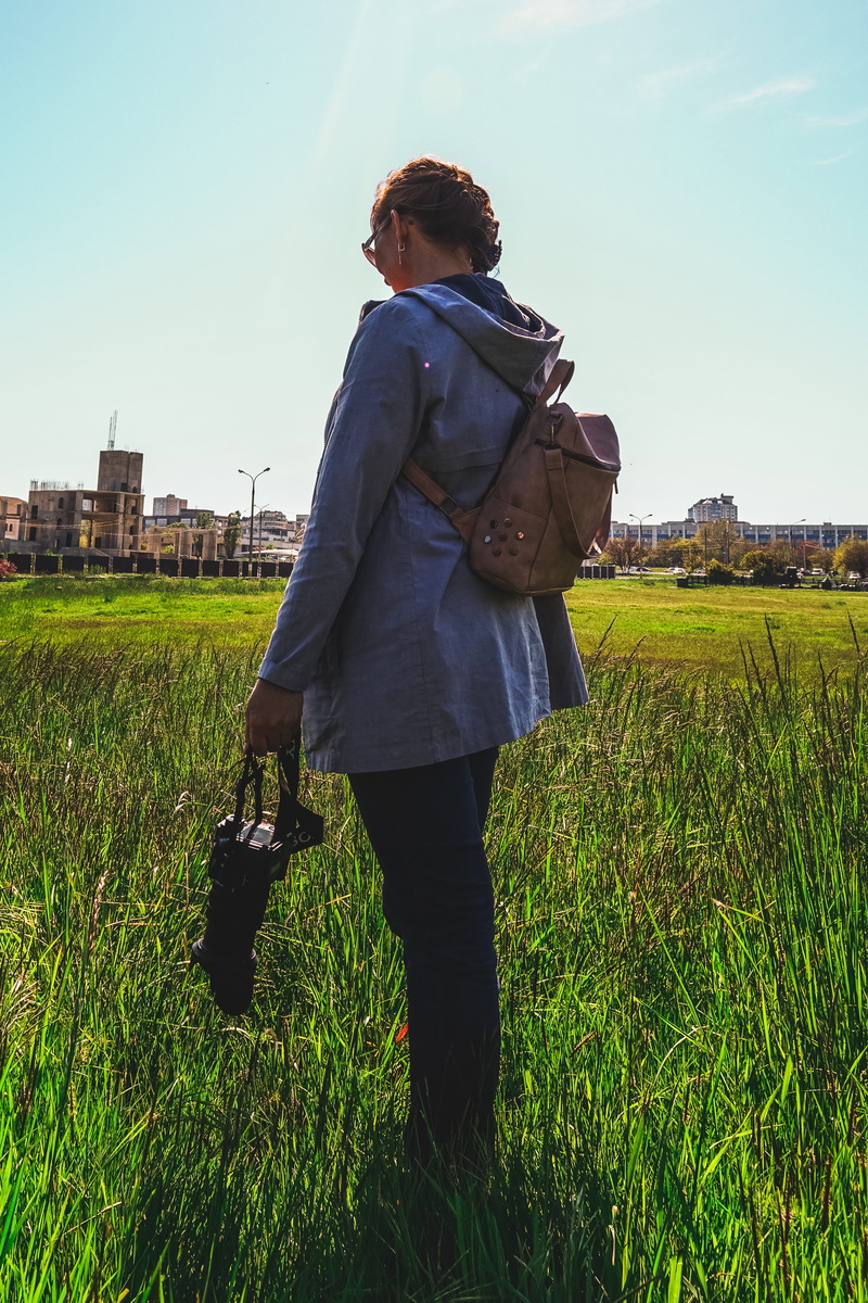 4K, casual clothing, woman, leisure activity, outdoors, sky, city, abandoned, plant, architecture, camera, photographer, landscape, green color, lensflare