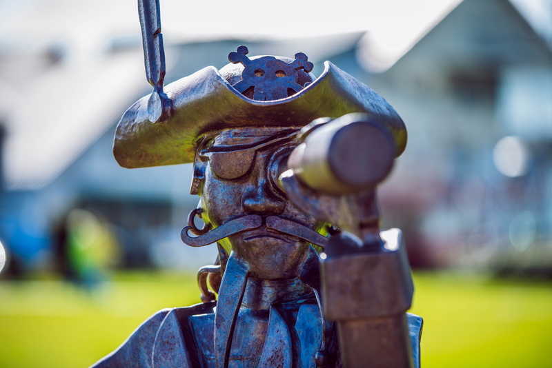 skull, weathered, metal, architecture, grass, vancouver island, sunlight, close-up, mustache, sidney, helmet, outdoors, creativity, hat, watching, machinery