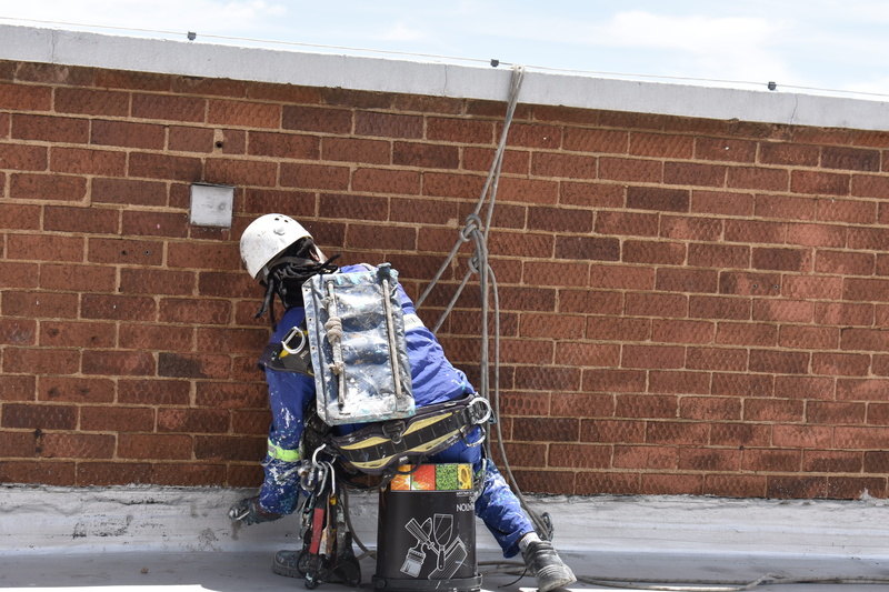 construct, 5K, real people, build, safety, standing, outdoors, building exterior, snow, warm clothing, day, cold temperature, johannesburg, construction