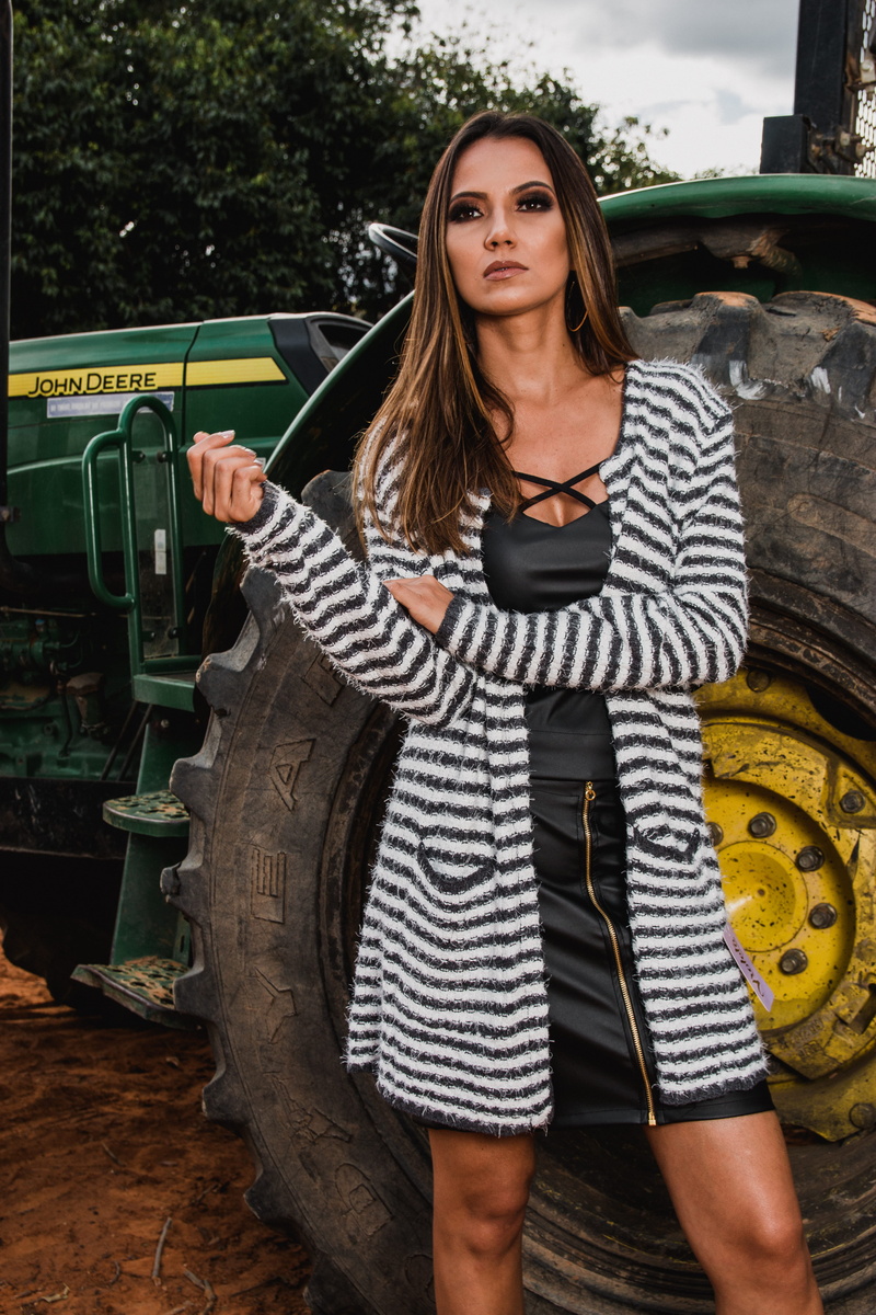 daytim, mode of transportation, long hair, looking at camera, black, john, one person, long, pink, behind, portrait, deere, transportation, casual clothing