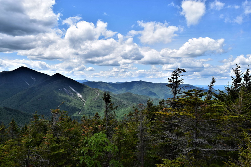 beauty in nature, green color, hike, camp, no people, sky, tranquility, forest, idyllic, cloud - sky, day, landscape, tranquil scene, mountain range, plant