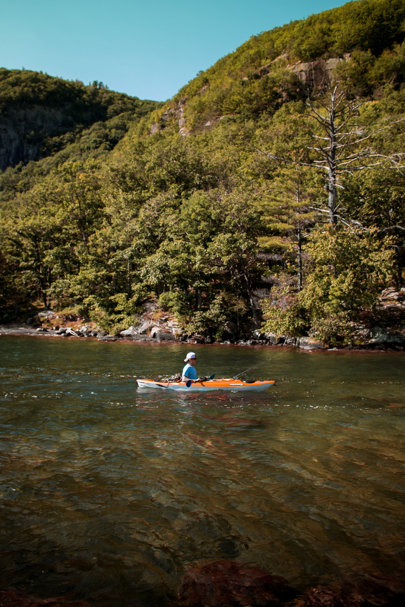 mountain, outdoors, real people, tree, leisure activity, livefolk, canoe, beauty in nature, summer, nautical vessel, ocean, nature, day, transportation