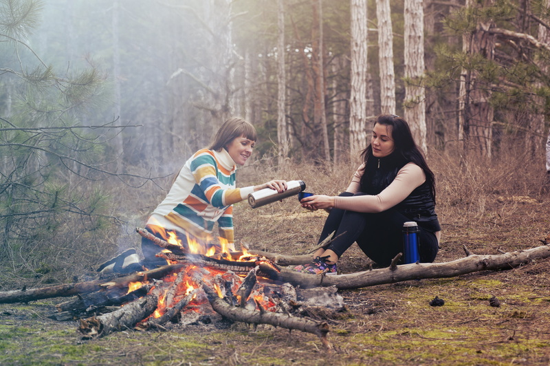 campfire, nature, friends, firewood, positive emotion, vacuum, fire - natural phenomenon, firepit, smile, forest, cup, happy, land, heterosexual couple