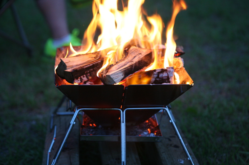 heat - Temperature, fireplace, outdoors, day, no people, fire - Natural Phenomenon, wood - material, close-up, motion, firewood, barbecue, focus on foreground