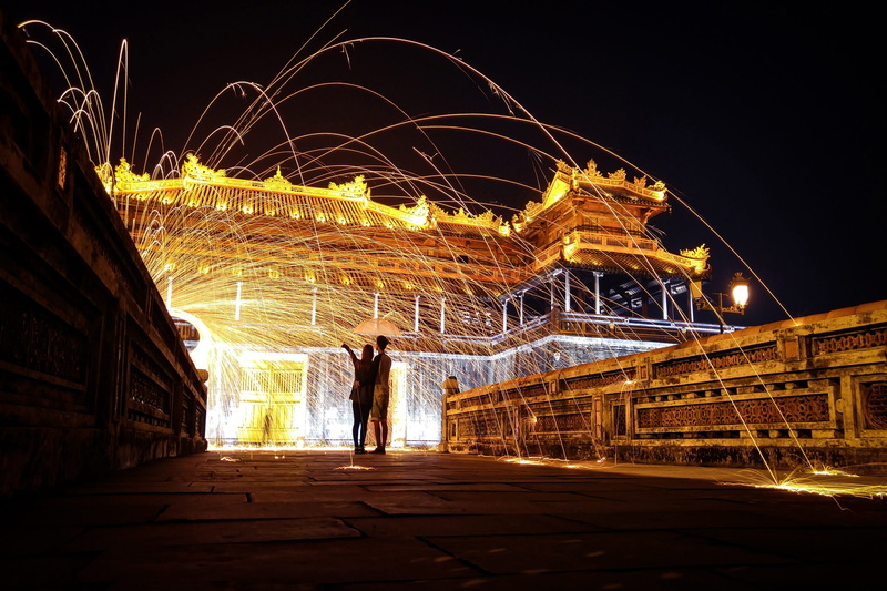 2K, night, rear view, men, sky, lifestyles, scenery, build, sunset, architecture, real people, blurred motion, sparks, illuminated, pm ta, city, standing