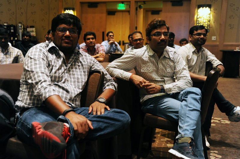 adult, town hall, smiling, mid adult, three quarter length, audience, crowd, leisure activity, sitting, footwear, 4K, lifestyles, mature adult, group of people