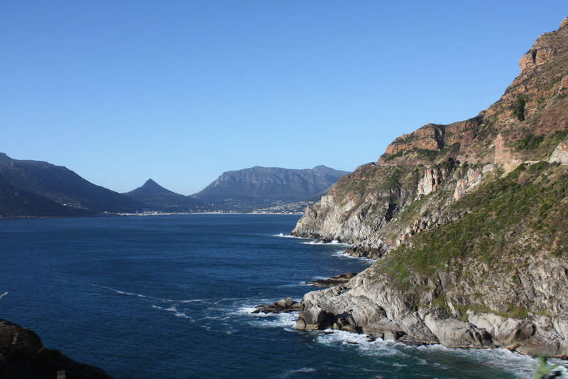 mountain range, rock - object, clear sky, water, chapmans peak drive, solid, blue, beauty in nature, copy space, sky, sea, nature, no people, chapmans peak