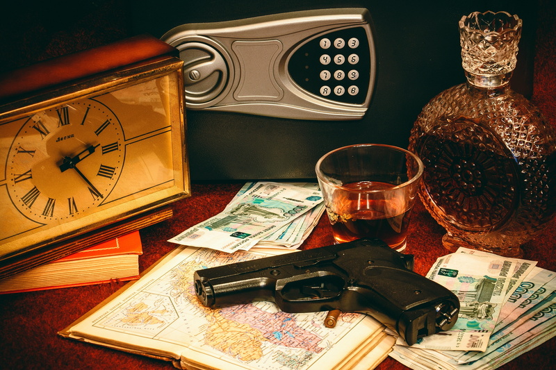publication, retro styled, money, office, camera - photographic equipment, vault, time, vintage, bottle, refreshment, bullet, antique, indoors, table, close-up