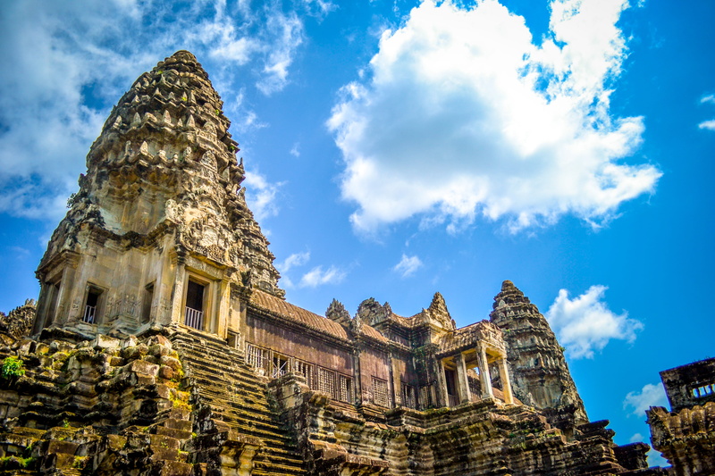 stone material, outdoors, famous Place, angkor wat, archaeology, ancient civilization, cambodia, building, sky, low, blue, angle, history, asia, cloud - sky