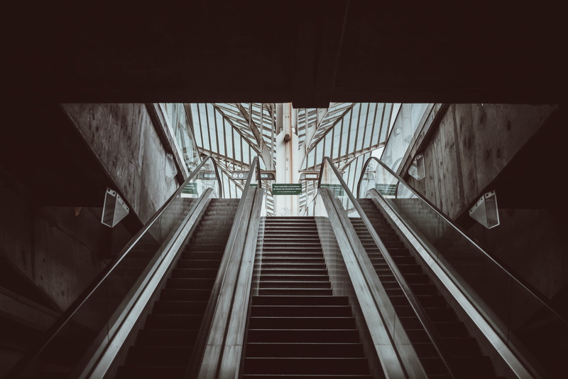 ceiling, directly below, gray, concrete, underground, staircase, modern, symmetry, technology, turned, diminishing perspective, connection, railing, town