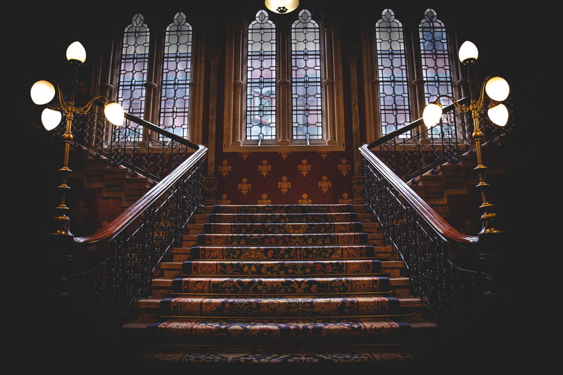 plant, london, steps and staircases, symmetry, window, religion, lighting equipment, street, electric lamp, night, architecture, spirituality, low angle view