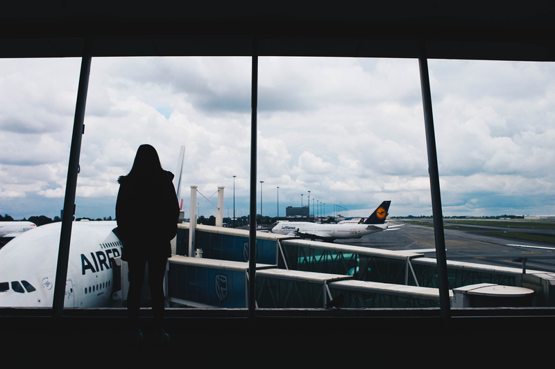 transparent, flying, day, sky, airfrance, outdoors, standing, rear view, south africa, johannesburg, real people, nature, transportation, waiting, glass - material