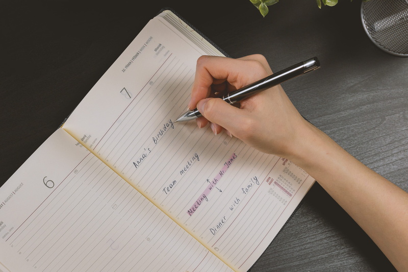 woman, table, holds, human hand, education, writing, holding, diary, to do list, note pad, one person, handwriting, close-up, writes, pencil, school supplies