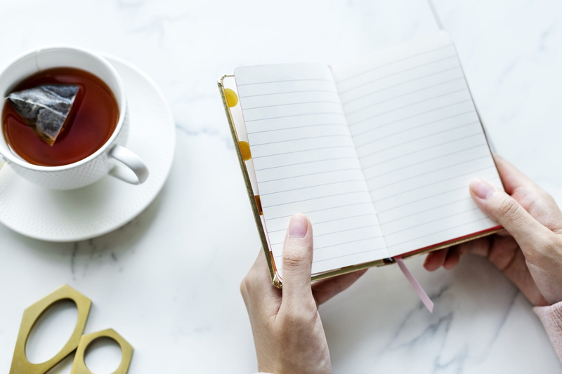 mug, finger, office, coffee - drink, one person, high angle view, indoors, table, pen, cup, blank, human body part, coffee cup, drink, crockery, holding