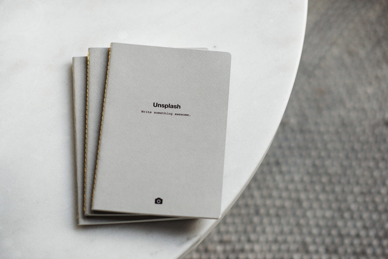 book, studio shot, simplicity, message, note pad, high angle view, close-up, publication, reminder, single object, list, paper, table, gray, selective focus