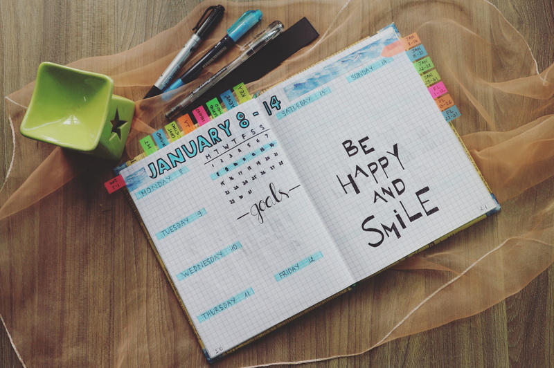 note pad, pen, western script, text, pens, planner, wood - material, indoors, handwriting, learning, creativity, people, motivational, notebook, education