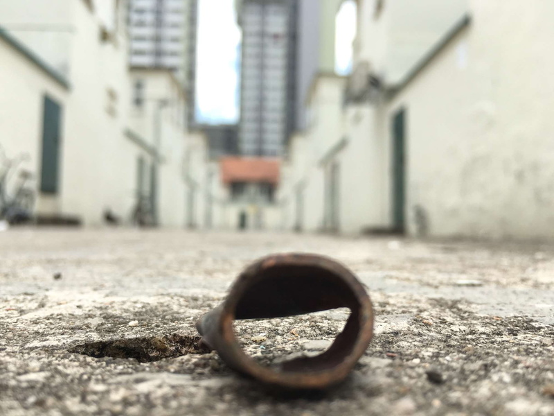 surface level, architecture, city, metal, office building exterior, street, close-up, focus on foreground, shape, selective focus, built structure, geometric shape