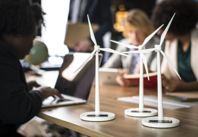 alternative energy, model, table, learning, group of people, wooden, renewable energy, sitting, females, discussing, windmill, 2K, prototype, woman, technology