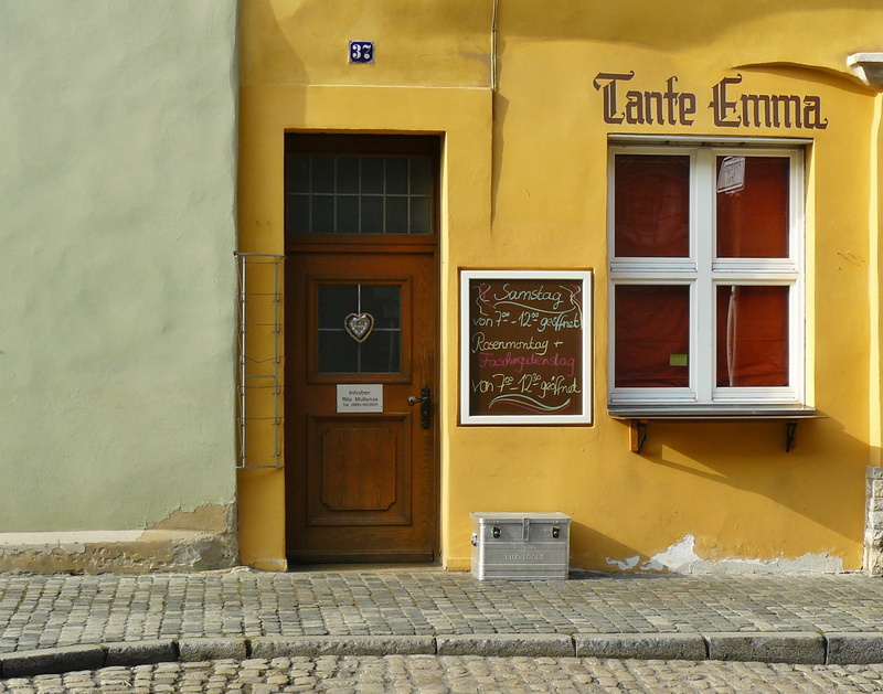 building, lattice windows, business, wall - building feature, security, outdoors, facade, communication, street, no people, protection, brown, entrance