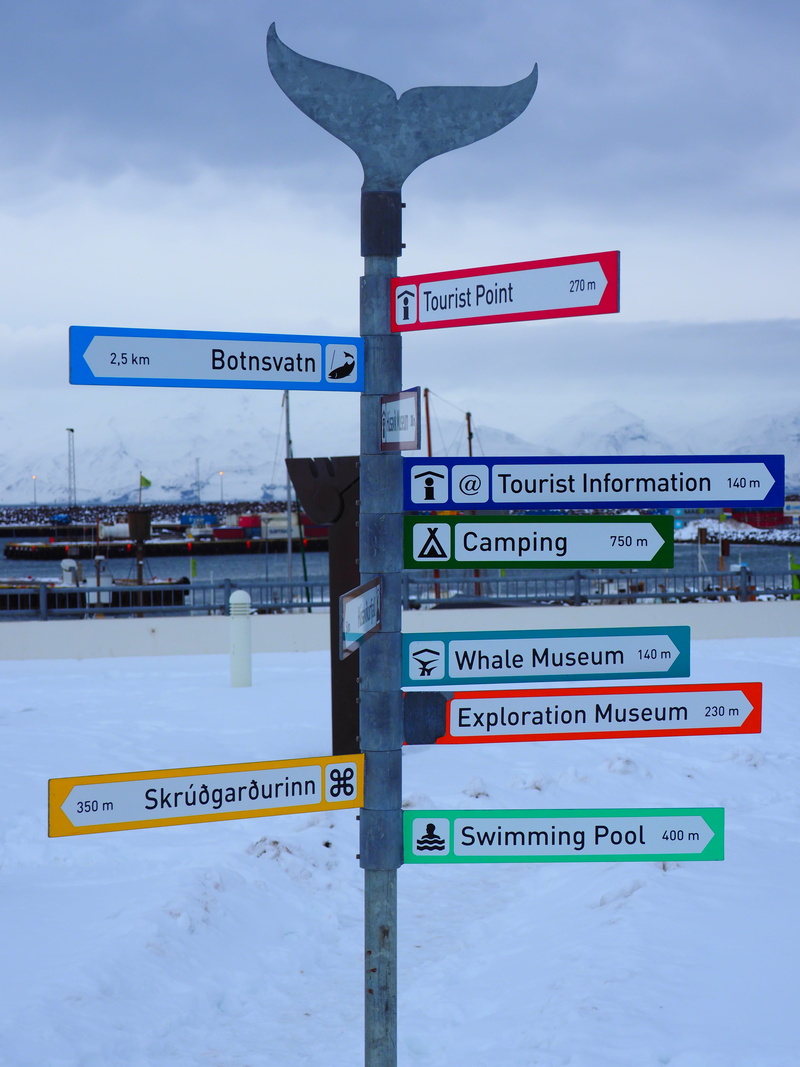 text, wise direction, sky, color, signposts, winter, street name sign, directional sign, information boards, street sign, information sign, sign, direction