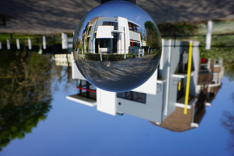 focus on foreground, waterfront, upside down, sphere, day, architecture, building, plant, 5K, reflection, rietveld-schröder house, nature, water, building exterior