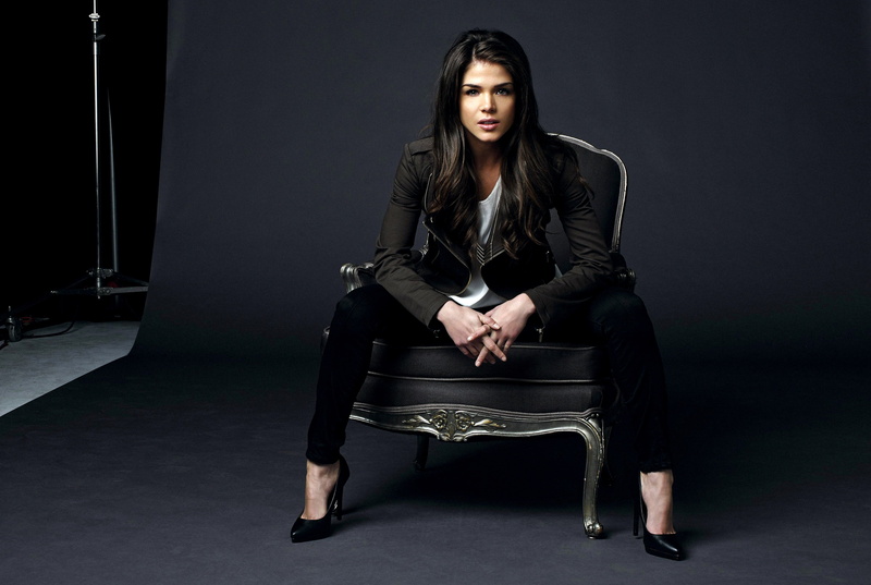 looking at viewer, sitting, Marie Avgeropoulos, chair, Black clothes, jacket, long hair, 4K, brunette, model, studios, actress, high heels, open mouth