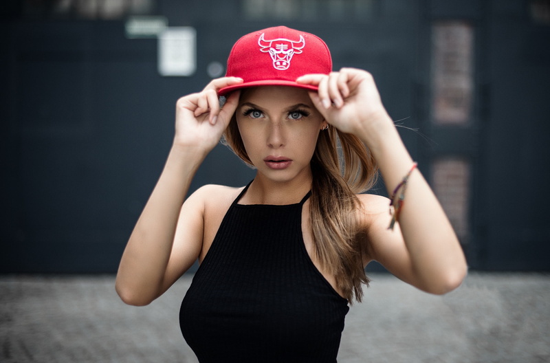 beauty, standing, clothing, waist up, baseball caps, women outdoors, focus on foreground, beautiful woman, front view, casual clothing, blonde, cap, depth of field