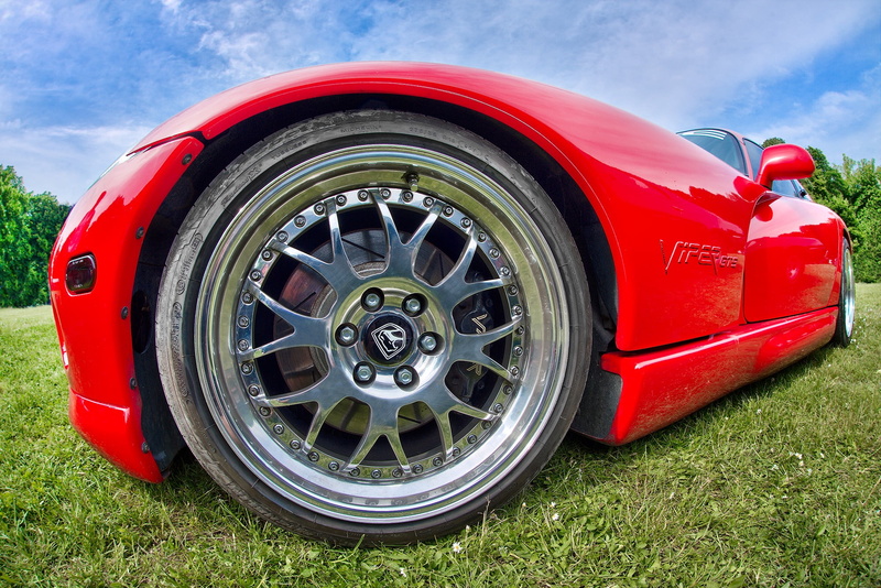sky, no people, metal, technology, red, mode of transportation, wheel, tire, plant, travel, day, luxury, silver colored, VIPER, land vehicle, chrome, land