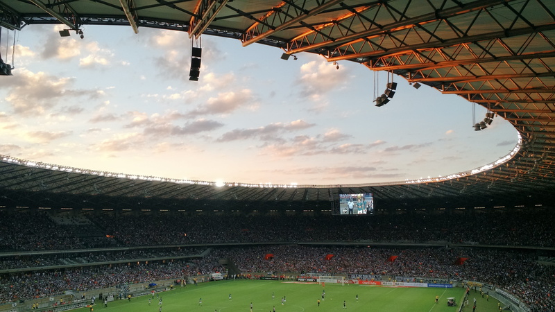 arena, soccer field, outdoors, play, spectator, group of people, audience, low angle view, cloud - sky, competition, team sport, championship, spectators