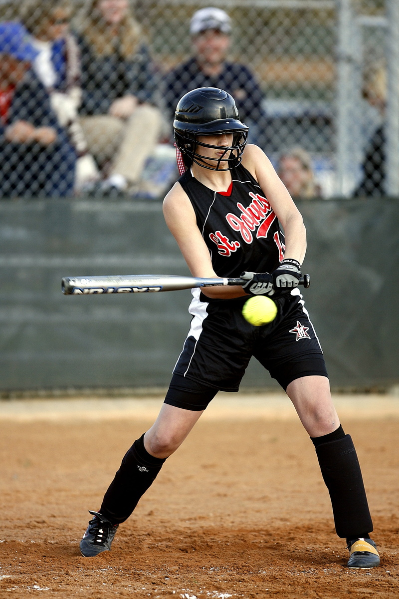 swinging, youth, female, skill, hitter, girls, full length, helmet, front view, one person, home, leisure activity, teen, clothing, uniform, bat, lifestyles