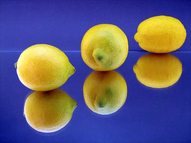 group of objects, indoors, fresh, still life, blue background, juicy, food, fruit, healthy, colored background, closeup, sour, studio shot, wellbeing, geometric shape