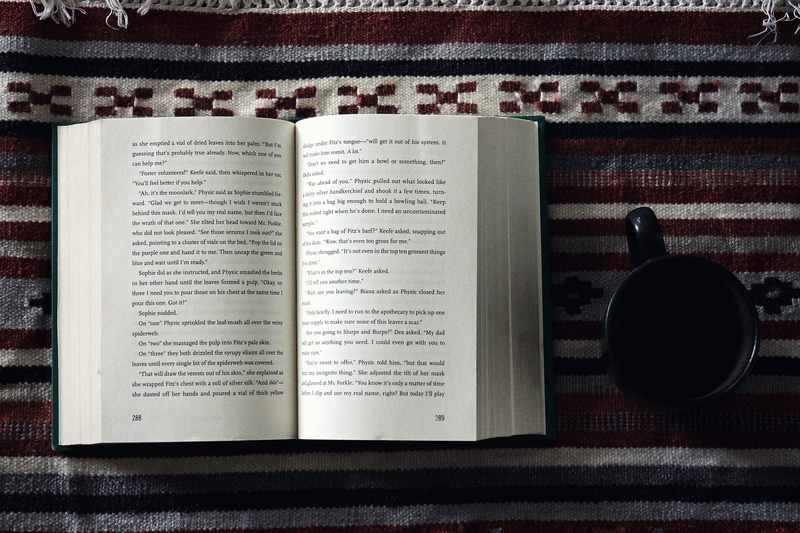 western script, close-up, arts culture and entertainment, fiction, expertise, music, read, still life, athstetics, literature, table, high angle view, chapter