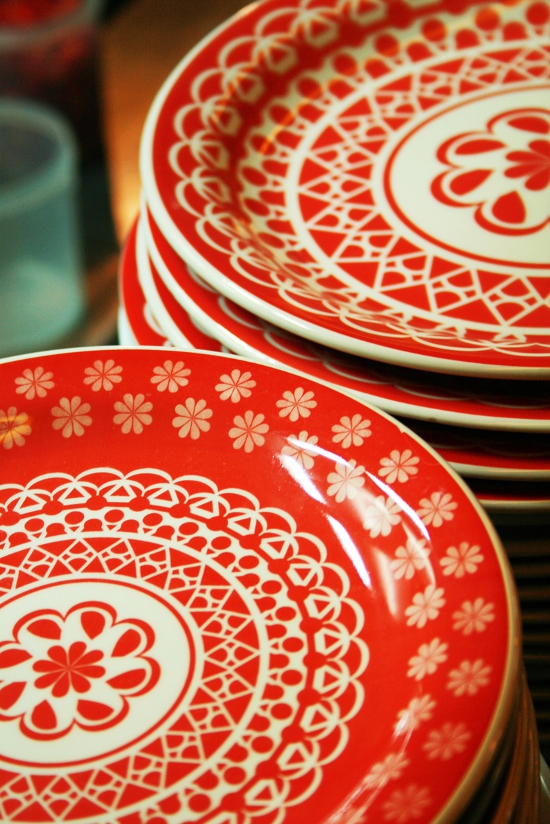container, ornate, no people, floral pattern, glyph, indoors, crockery, table, festival, art and craft, communication, non-western script, close-up, red
