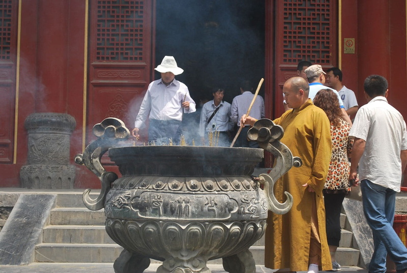 east Asian Culture, men, place of worship, temple - Building, group of people, building exterior, day, urban Scene, rear view, holy, Cauldron, burning
