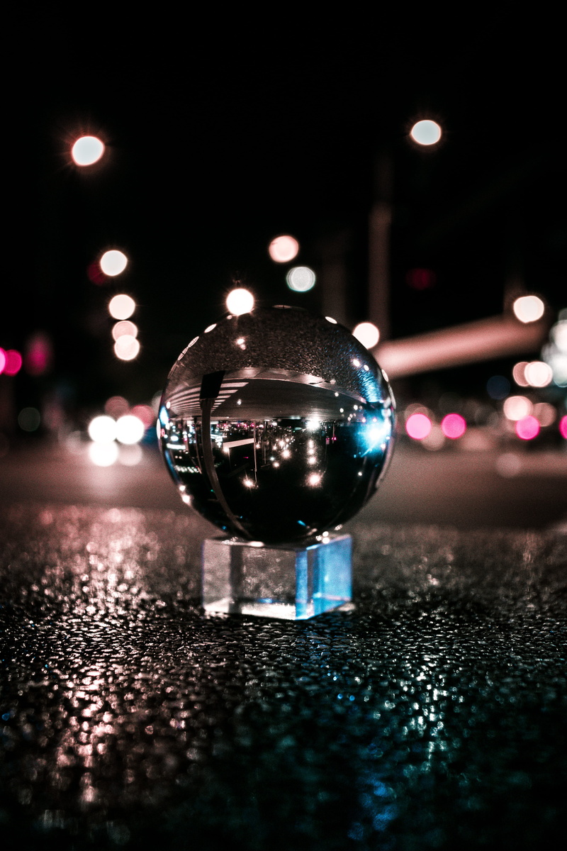 transportation, close-up, illuminated, no people, glass - material, city, night, selective focus, street, motor vehicle, sphere, indoors, peru, shape, road