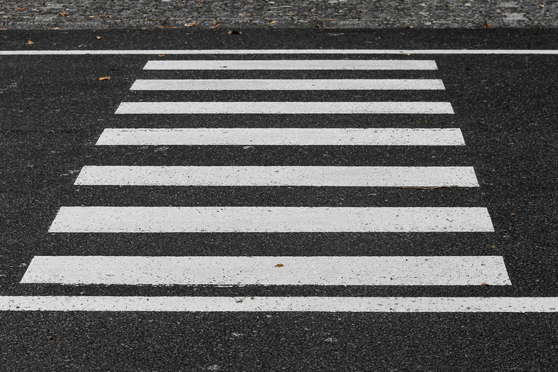 road sign, symbol, outdoors, ground, asphalt, pattern, city, day, safety, white, cross, car traffic, mark, dividing line, 4K, crosswalk, black and white