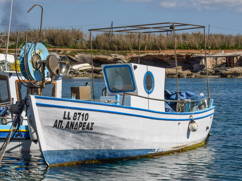 fishing shelter, boat, no people, sunlight, moored, blue, waterfront, traditional, number, water, communication, nautical vessel, sea, mode of transportation