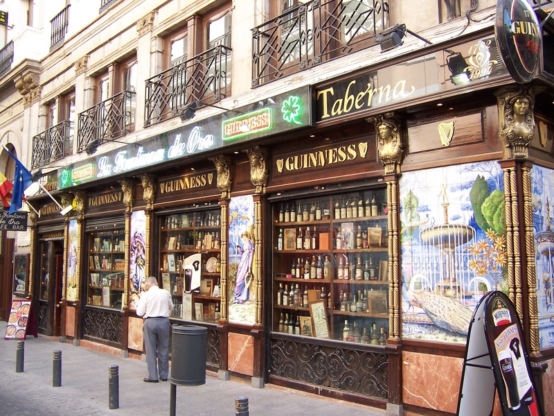 bottles, beer, day, irish, bar, architecture, tapas, store, window, outdoors, madrid, street, pipe, building, real people, building exterior, text, city life