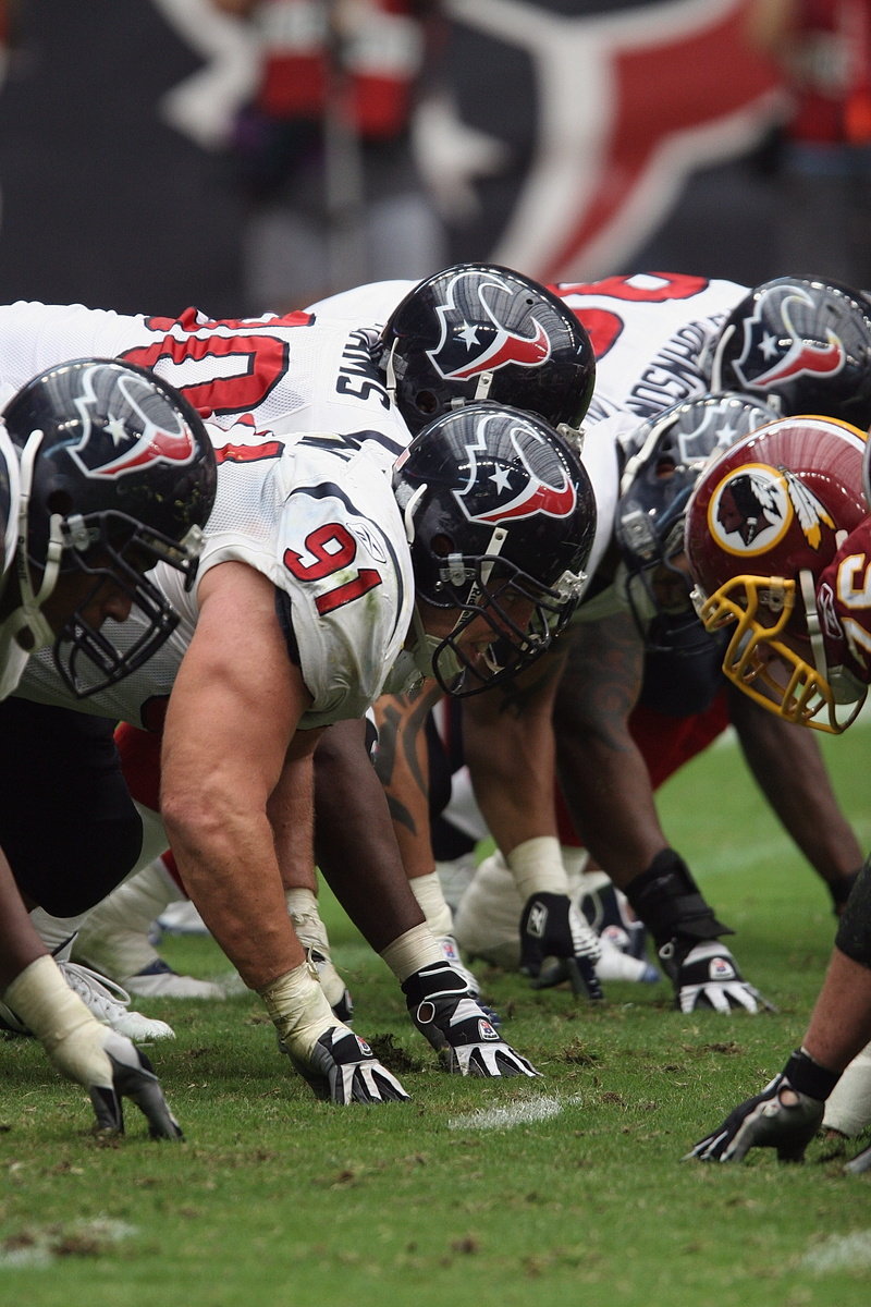 headwear, sport, real people, linemen, teamwork, professional football, american football - ball, muscular, american football - sport, field, texan, game