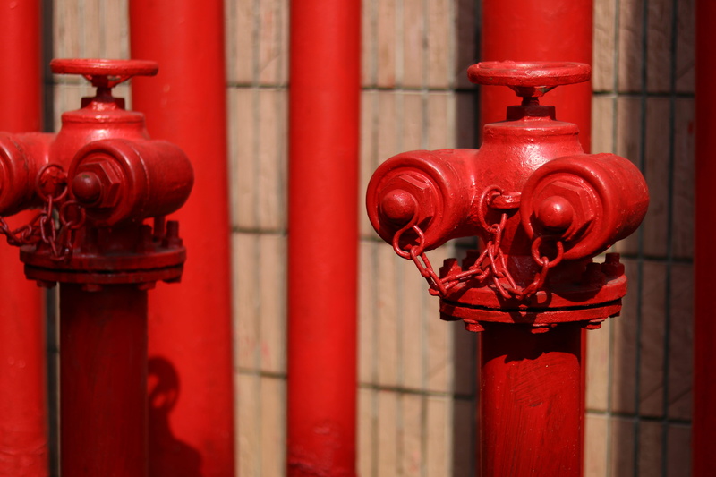 two, focus on foreground, red, lute, day, musical instrument, close-up, hippo, rust, built structure, safety, dome, building, lighter, no people, accidents and disasters