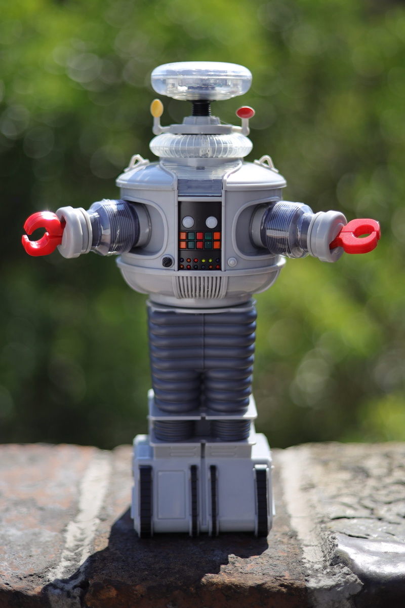 metal, fire hydrant, close-up, plant, no people, bokeh, retro toy, 2K, red, nature, control, selective focus, toy, retro, focus on foreground, safety