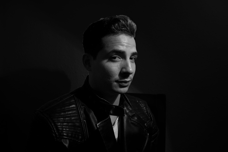 black and white, lloret de mar, indoors, spain, looking at camera, studio shot, headshot, dark, young adult, 50s, face, look, well-dressed, portrait, beautiful people